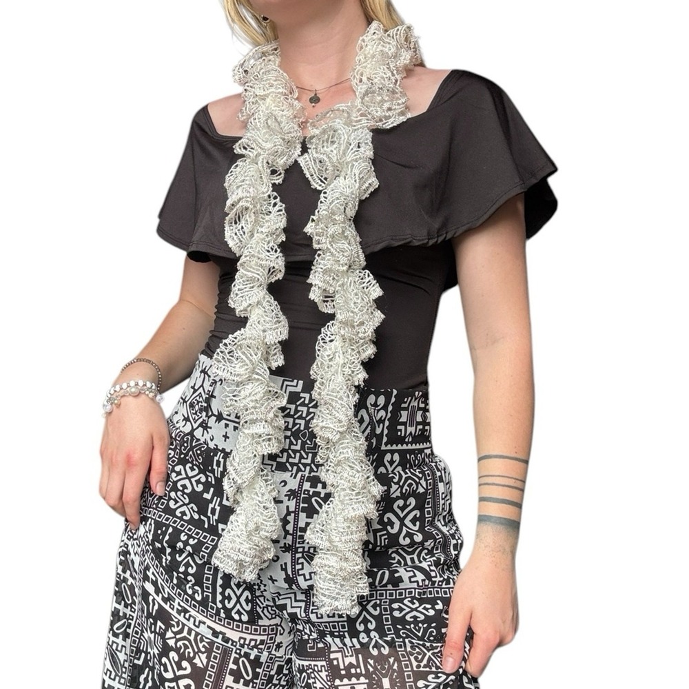 White crochet y2k scarf accessory with sequins knitted in for a cool shimmer